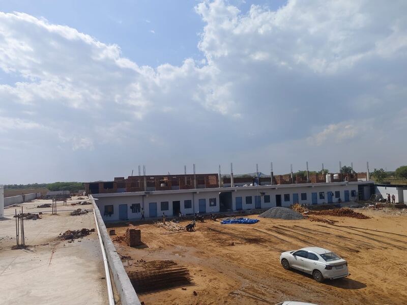 The same block earlier, with the roof on and finishes started
