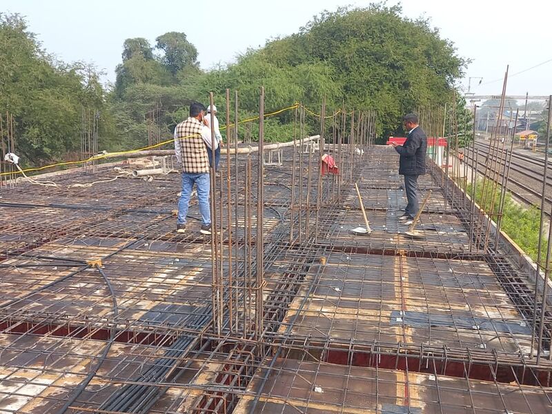 Platform structure over a live railway line